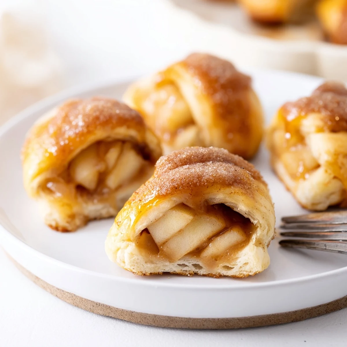 Buttery caramel apple crescent bites, golden and gooey, perfect for dessert lovers.  