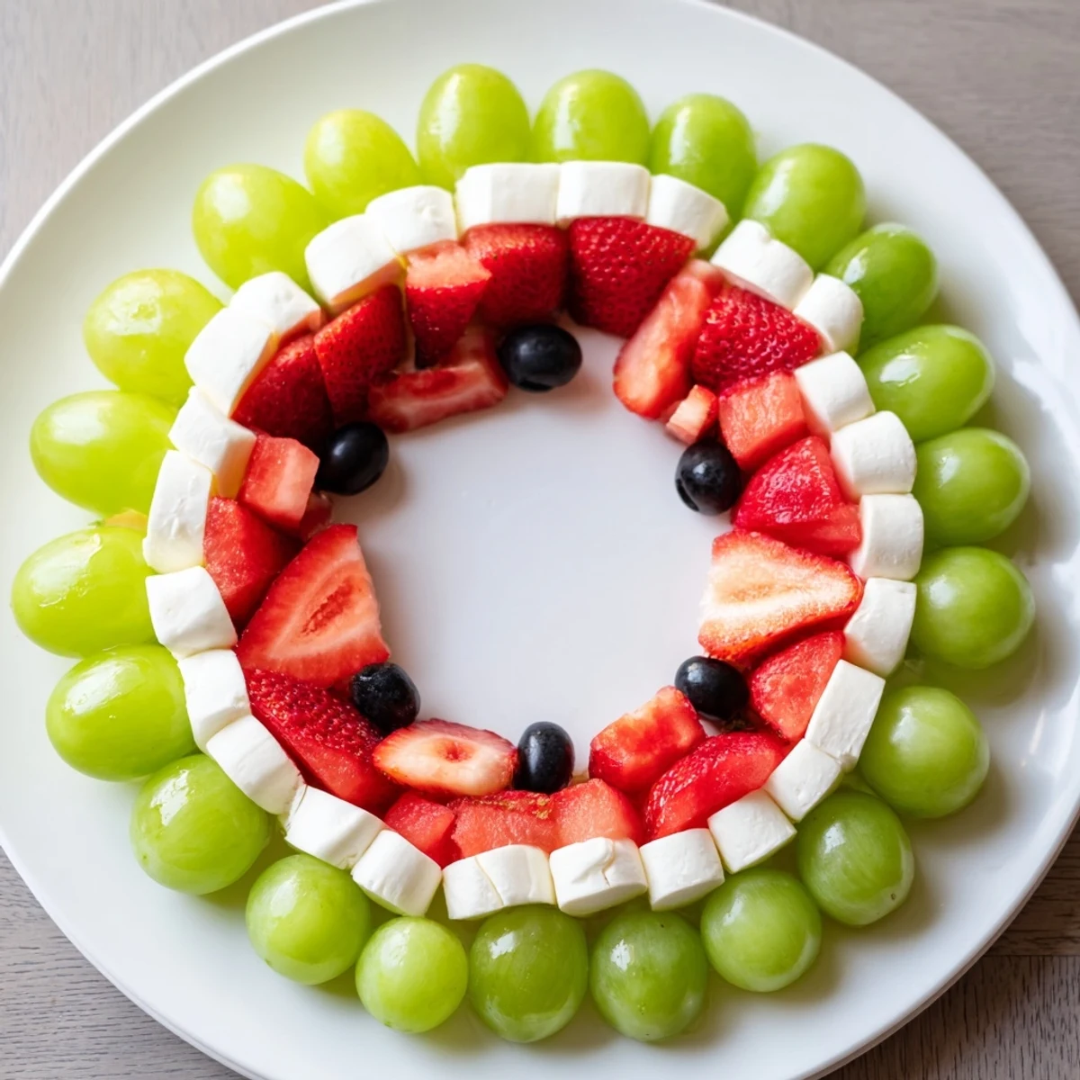 Summer Watermelon Slice beautifully arranged with vibrant watermelon, cheese, and refreshing grapes for a summer snack.