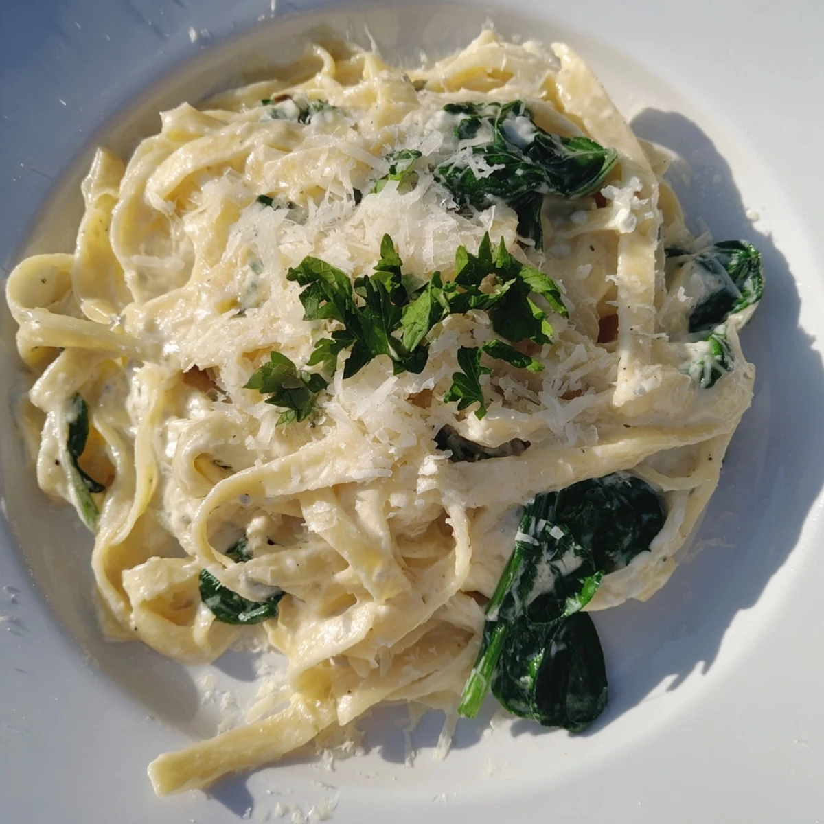 Creamy Spinach Fettuccine Alfredo: A vibrant, visually appealing plate of pasta, ready to warm your soul.