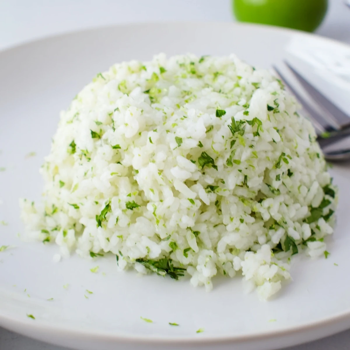 Fluffy cilantro lime rice, bright with lime, ready to enjoy.