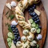 The Anchor Maritime Board: a coastal charcuterie board with brie, grapes, and arranged like an anchor.