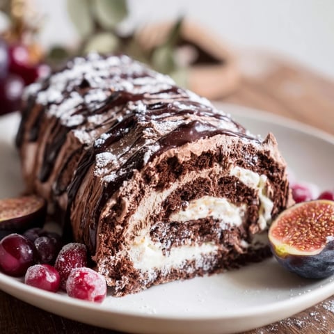 Winter Warmer dessert board with a rich chocolate roulade and festive treats: a cozy holiday spread.