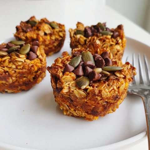 Spiced pumpkin muffin granola cups, perfect for breakfast or an on-the-go snack.  