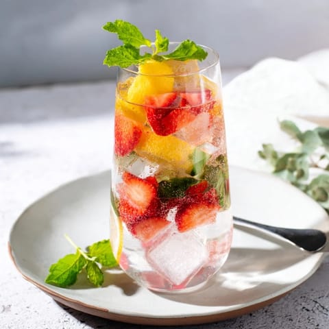 Bright and invigorating water-based mocktails featuring lemon and cucumber slices.  