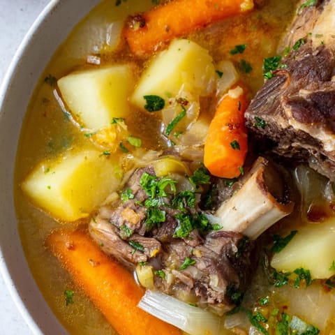 Flavorful Welsh Cawl, with tender lamb and fresh herbs, a warming, comforting food perfect for chilly evenings.