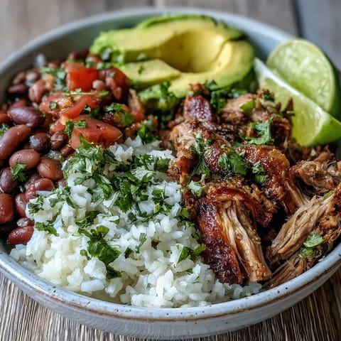 Fresh pico de gallo, creamy avocado slices, and chopped cilantro garnish the Mexican dish.