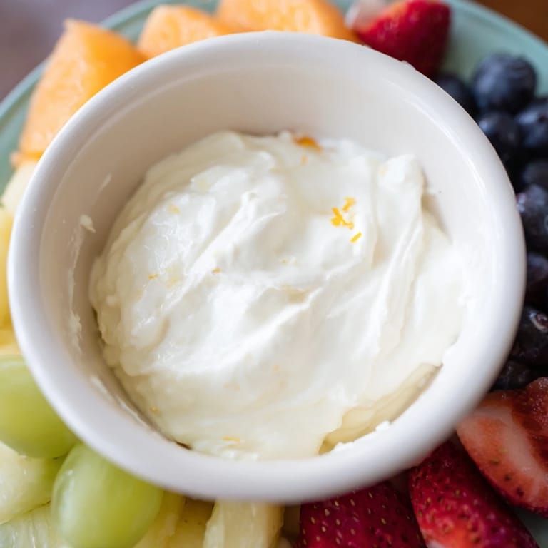 This vibrant cream cheese fruit dip offers a delightfully sweet and creamy appetizer experience with fruit.